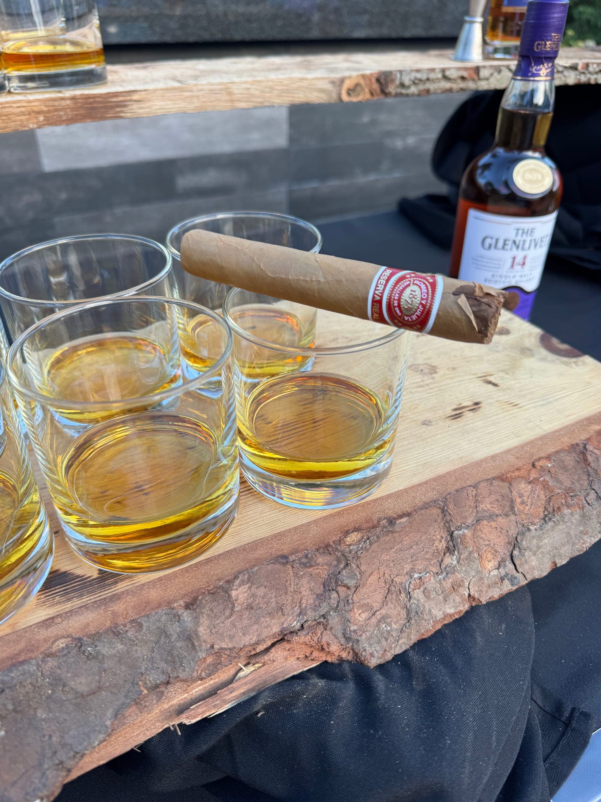 Cigar paired with aged single malt whisky during a guided tasting